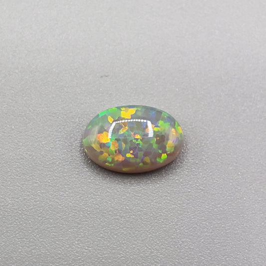 1.4cts Dark opal with a Green- Gold full facing floral pattern