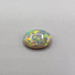 1.4cts Dark opal with a Green- Gold full facing floral pattern