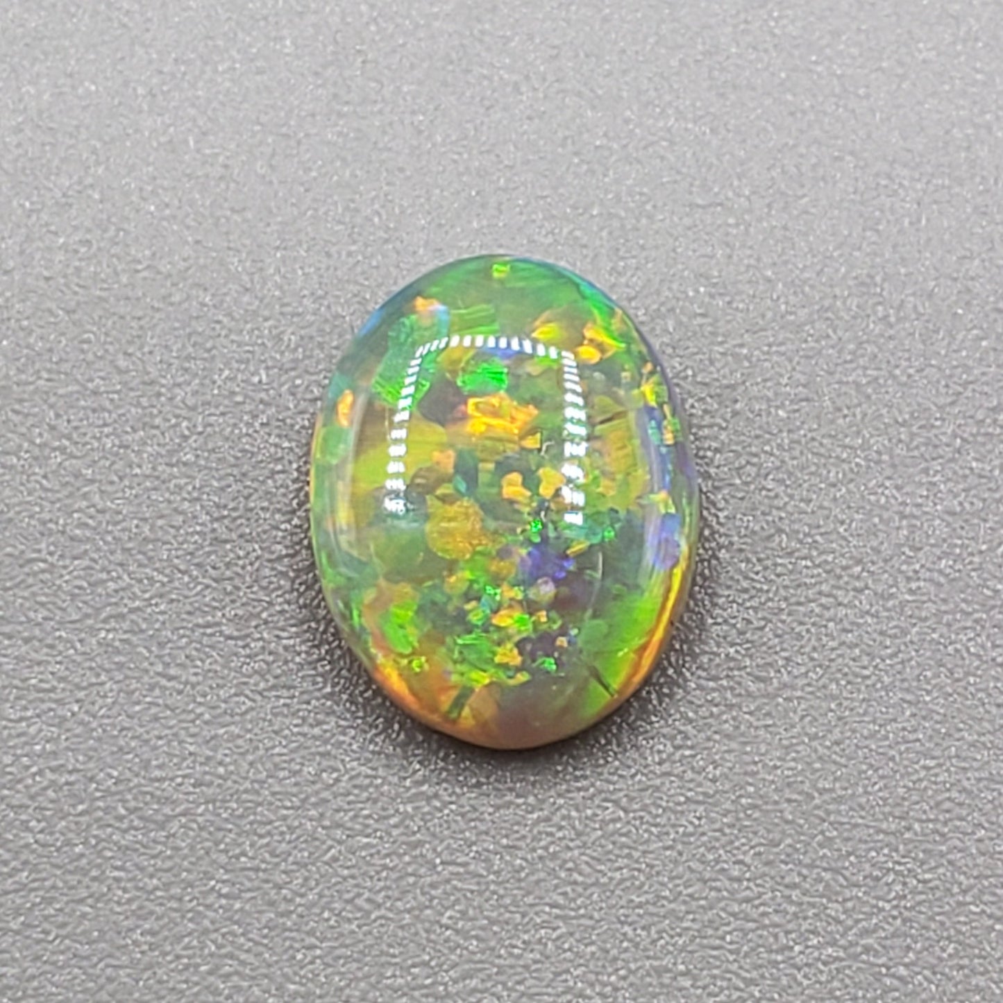 1.3cts Top Gem Dark opal with incredibly vivid overlapping floral patterns giving the stone an amazing depth of color