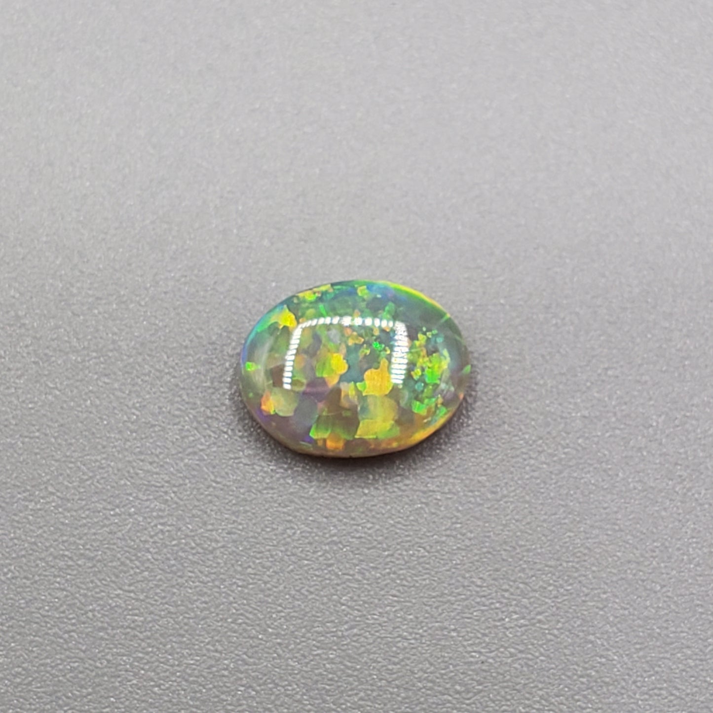 1.3cts Top Gem Dark opal with incredibly vivid overlapping floral patterns giving the stone an amazing depth of color