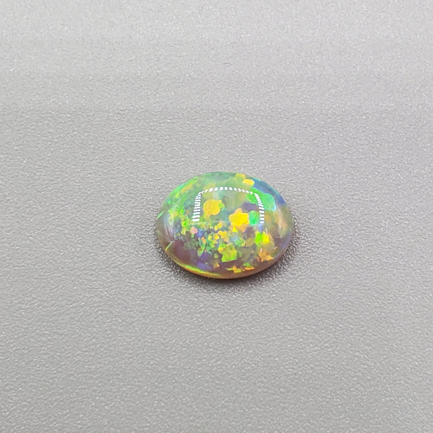 1.3cts Top Gem Dark opal with incredibly vivid overlapping floral patterns giving the stone an amazing depth of color