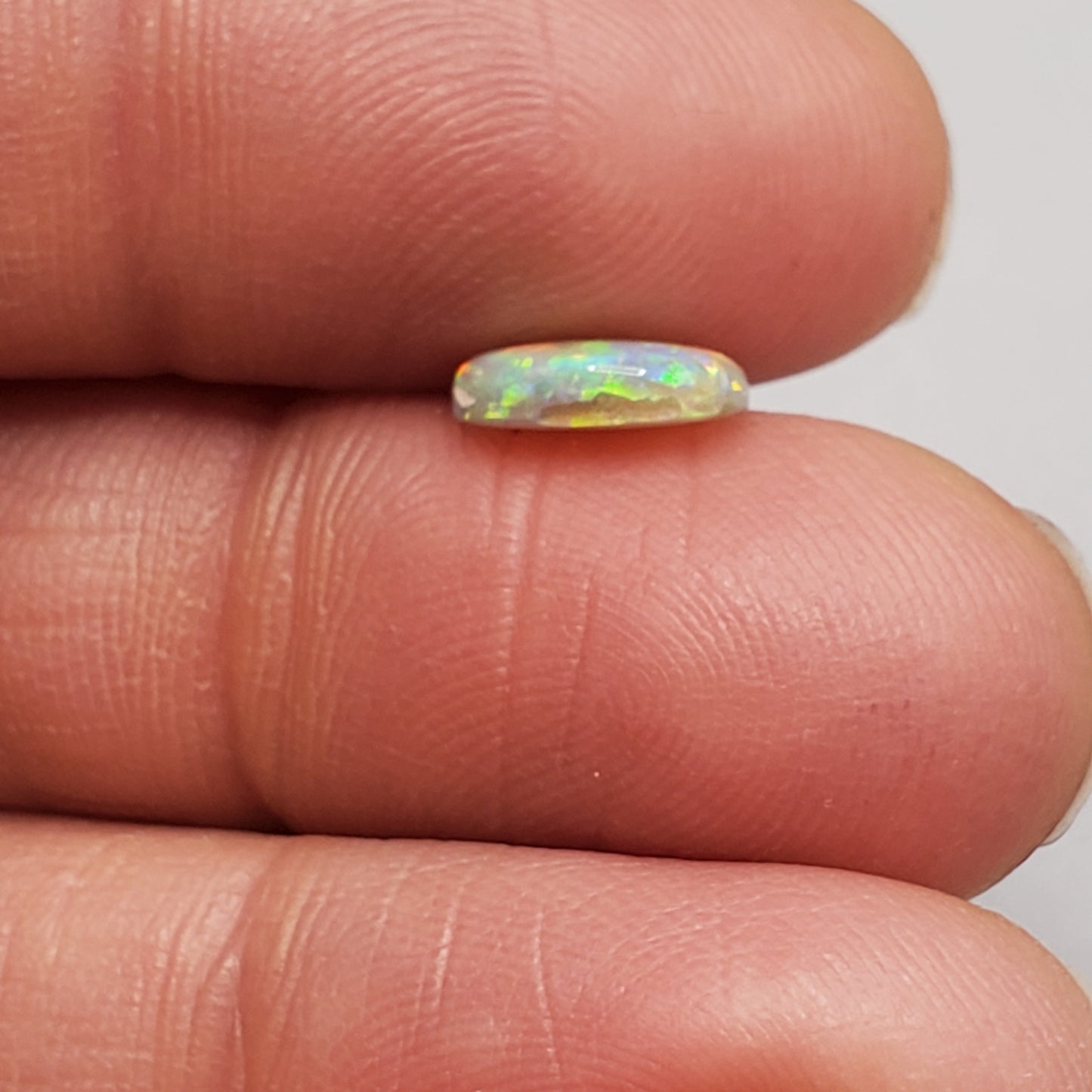 1.3cts Top Gem Dark opal with incredibly vivid overlapping floral patterns giving the stone an amazing depth of color