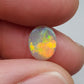 1.0ct Dark opal with Orange Green color play and a well-dispersed pattern