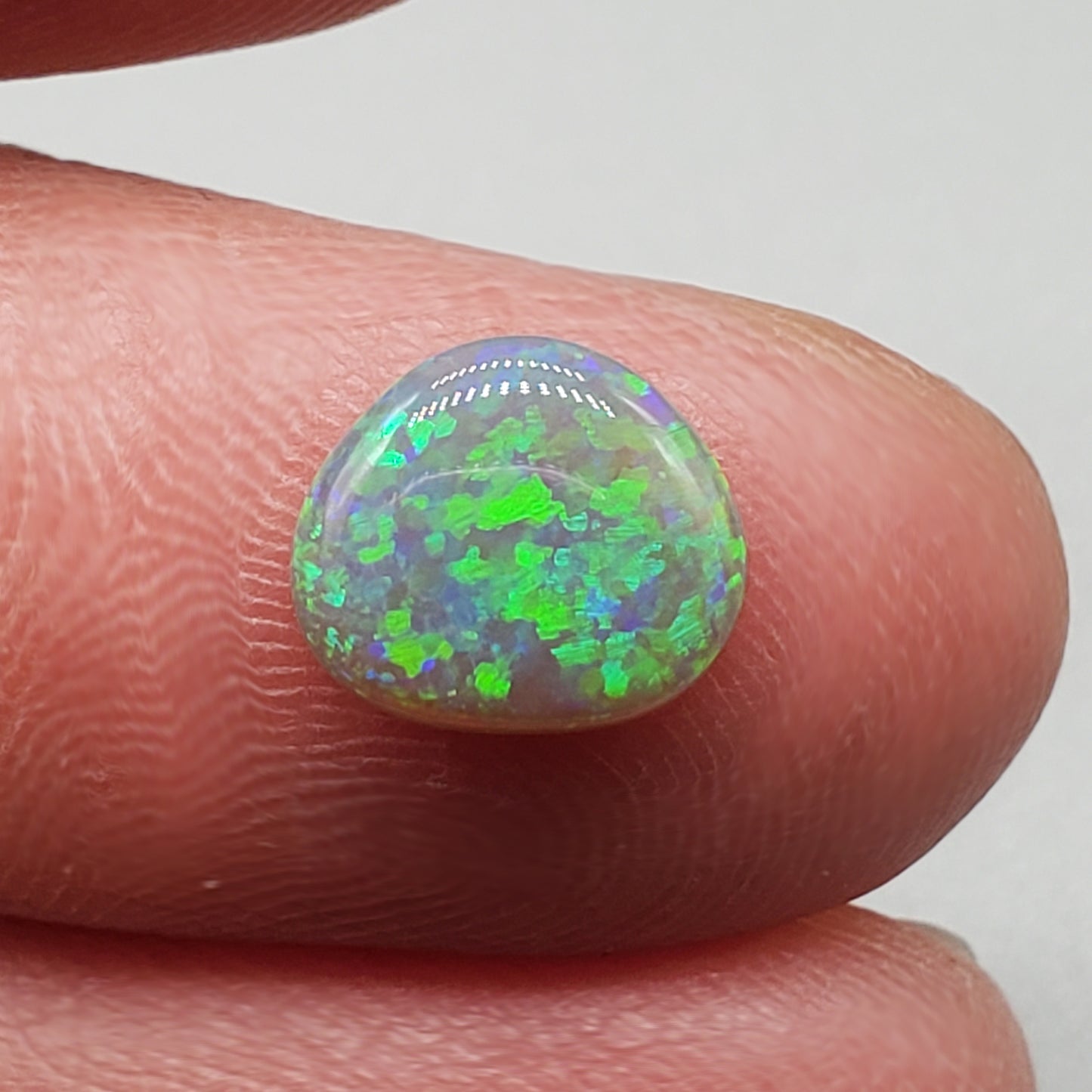 1.45cts Dark opal with rich Green floral pattern