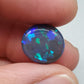 7cts Large Black Opal with well-dispersed, multi-shade Blue color play and an eye catching wispy pattern