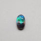 1.3cts Black Opal with Teal-blue rolling flash