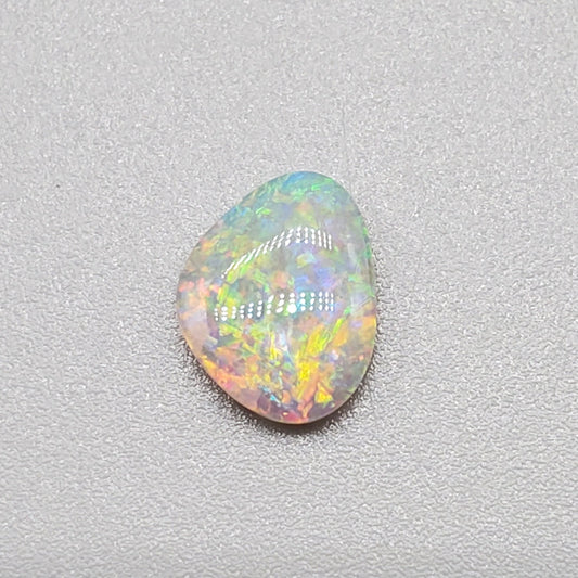 0.60cts Dark Opal with multi color palette and mixed pattern