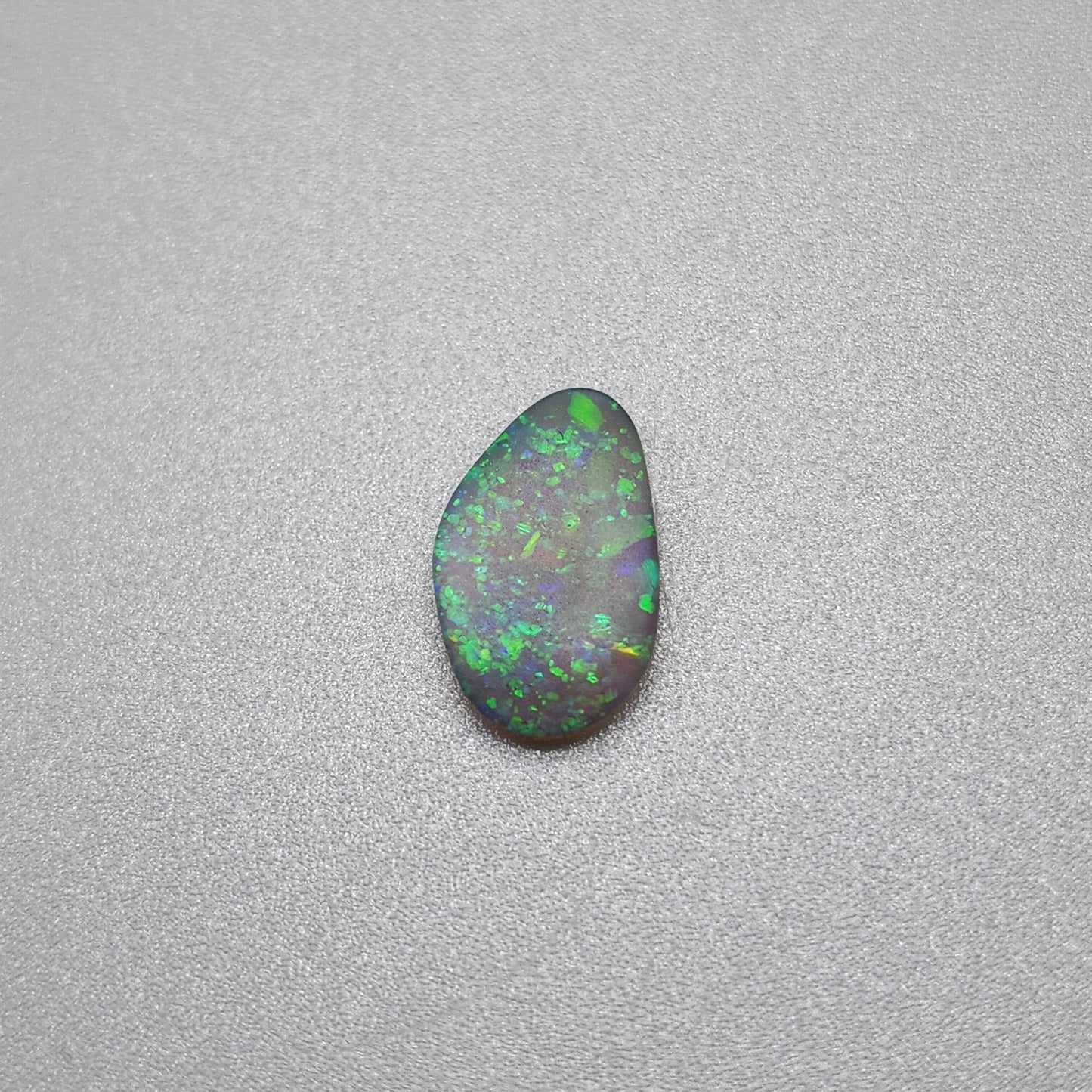 0.70cts  Matte dark Crystal Opal with lovely Green speckled pattern