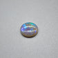 1.8cts Dark opal with blue green color play and blocky pattern with chaff