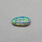 0.9ct freeform Dark Opal with aesthetic Green/blue pattern