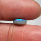 2.5ct Dark opal with a a dark blue base overlane by a minty green chaff pattern