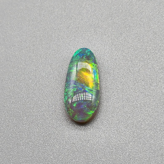 2.3ct Dark opal with gold-green color play and lovely pattern