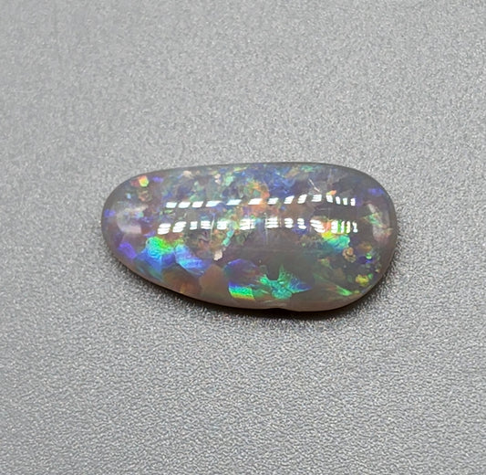 2.25cts  Dark opal with a pastel color pallet and mixed patterning