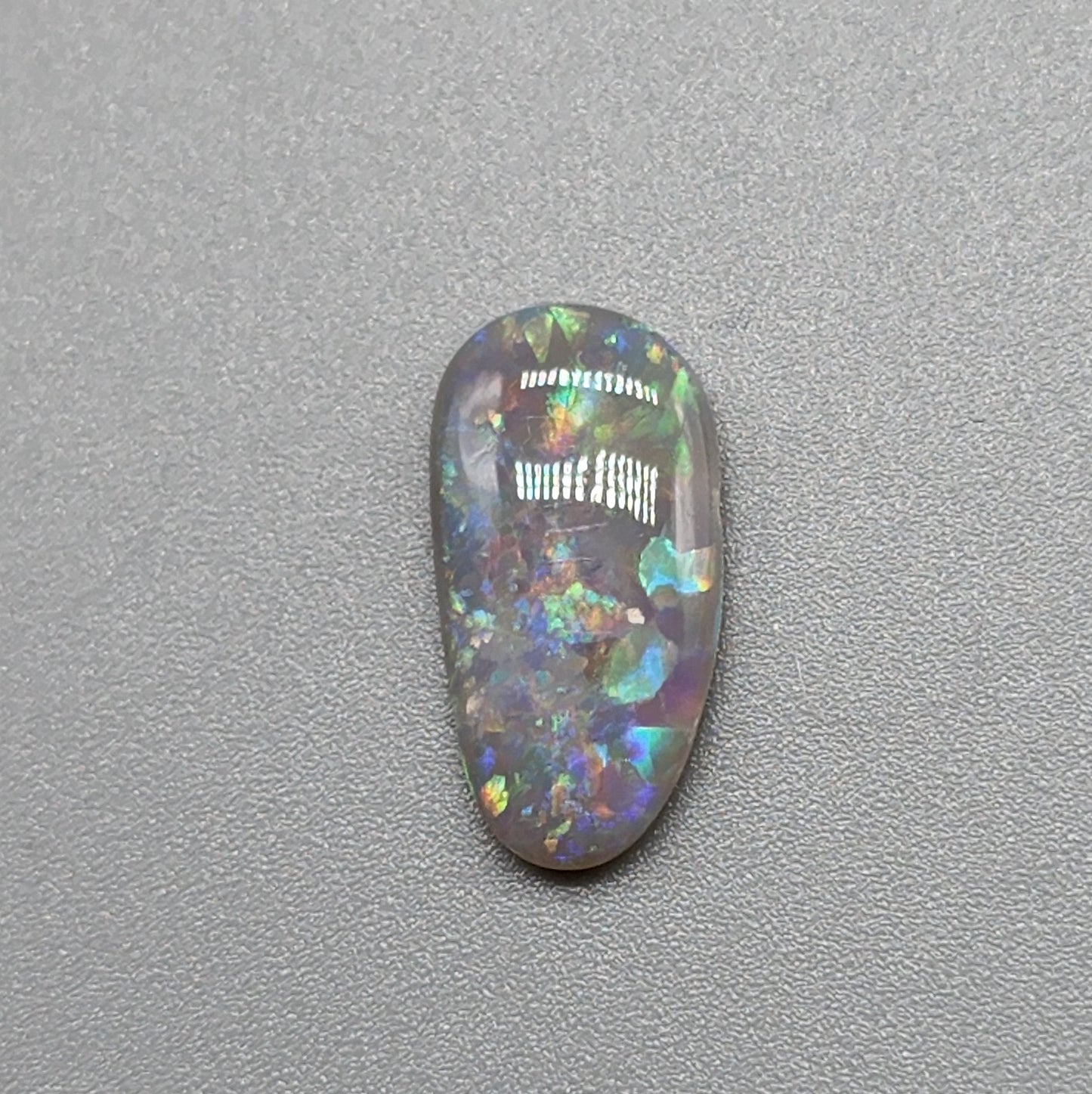 2.25cts  Dark opal with a pastel color pallet and mixed patterning