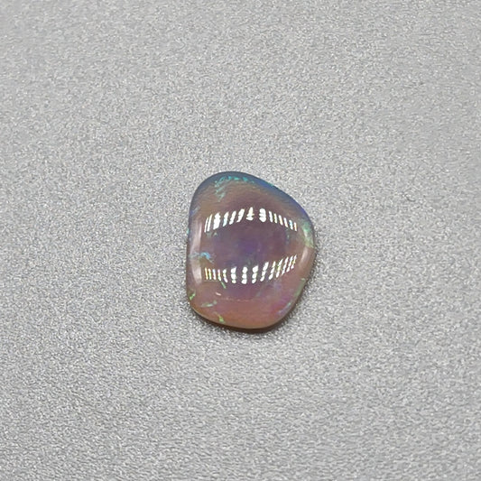 0.65cts Dark Crystal Opal with Green/blue broad flash