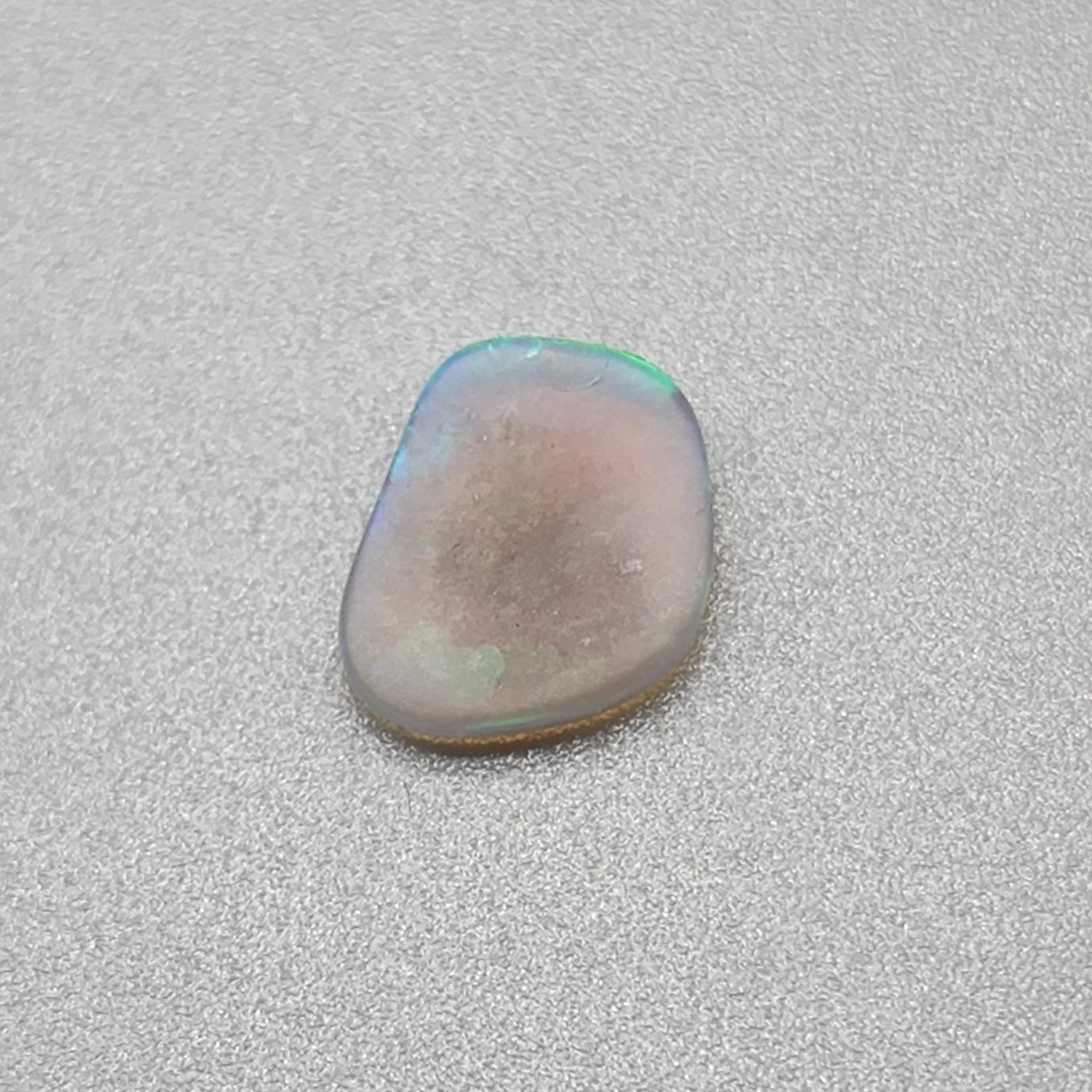 0.65cts Dark Crystal Opal with Green/blue broad flash