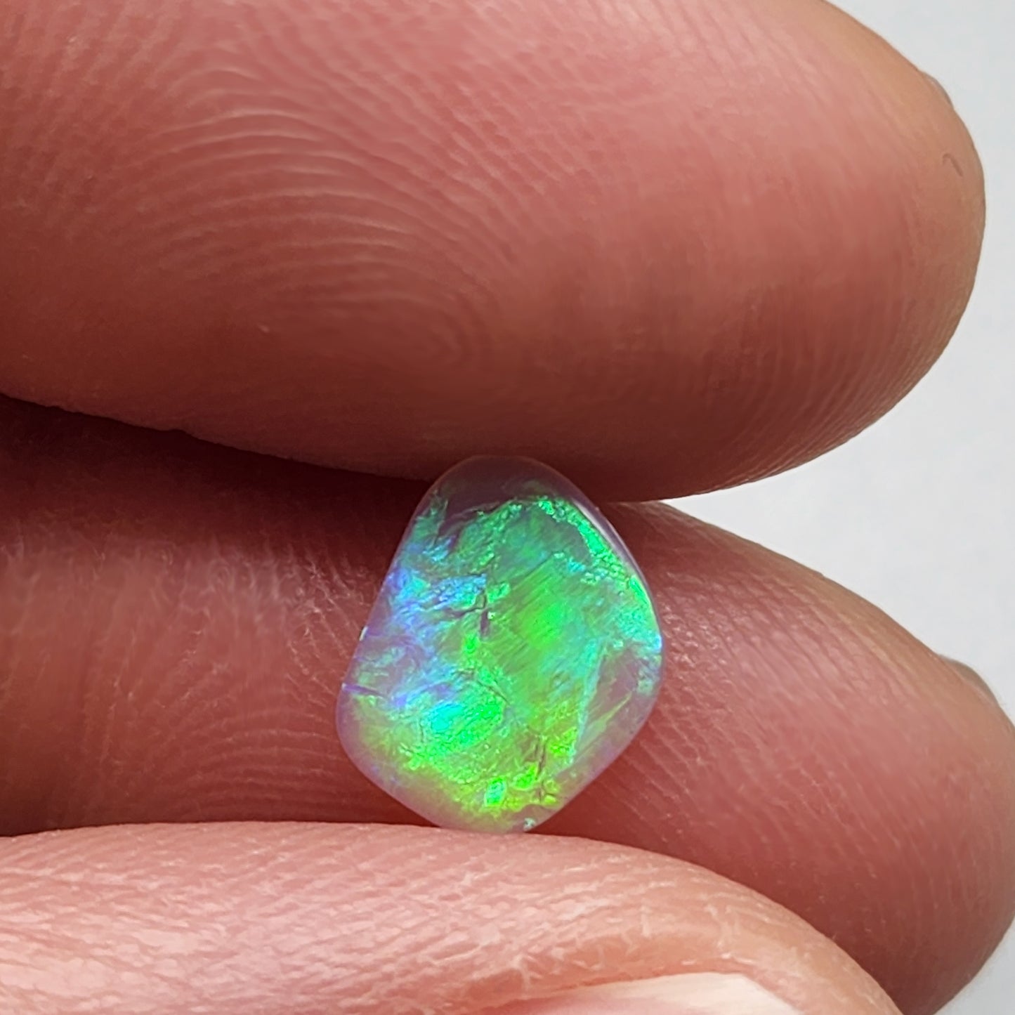 0.65cts Dark Crystal Opal with Green/blue broad flash