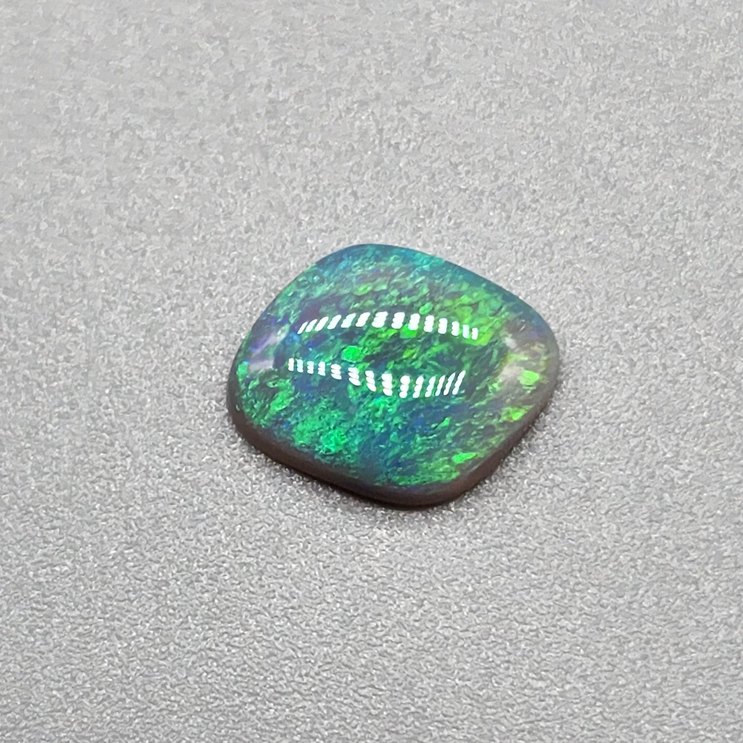 1.3cts Dark opal with Tealy color pallet and a classic mossy pattern