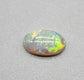 2.4cts dark opal with a yellow multicolor pallet and mixed patterns