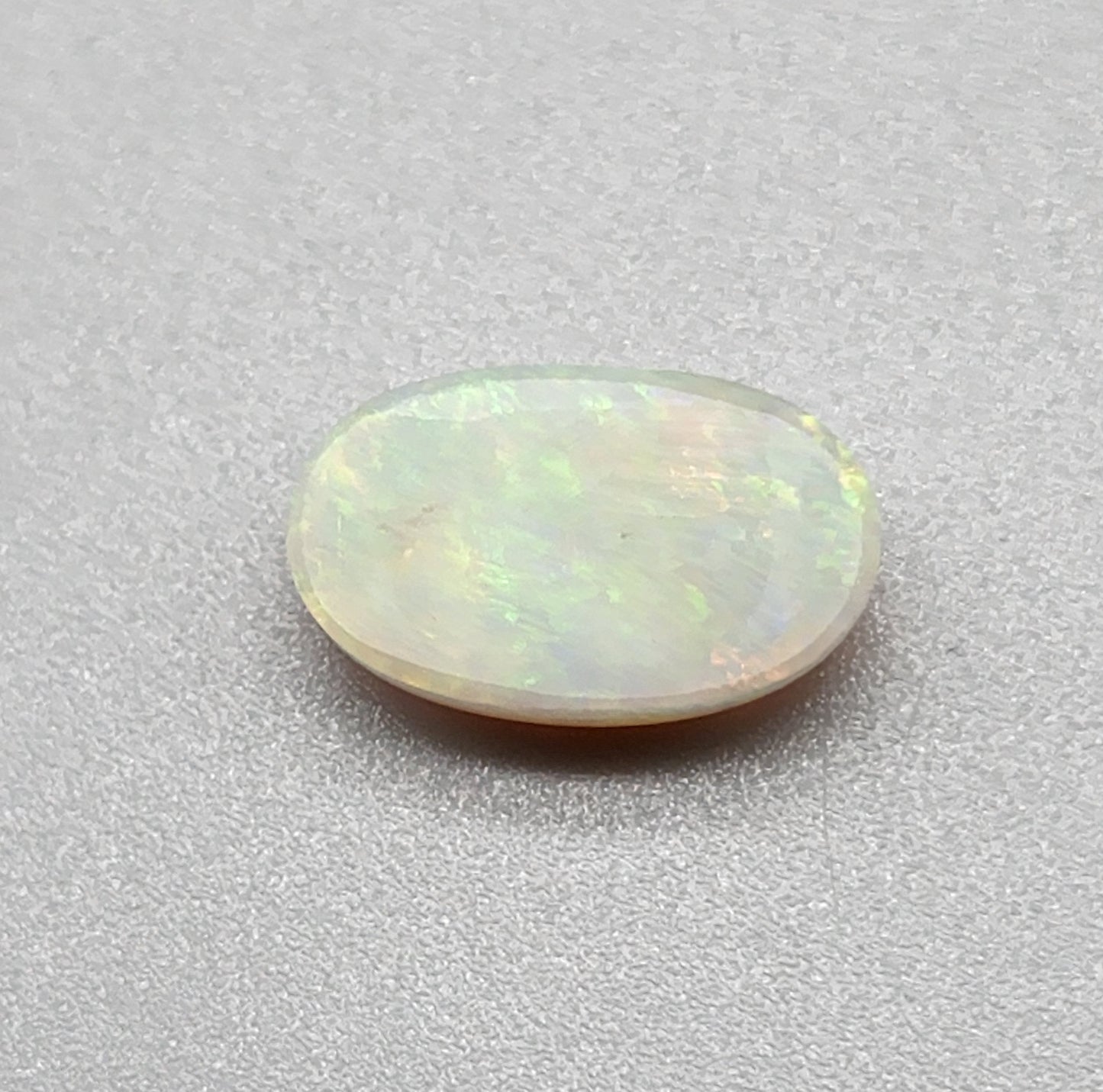 2.4cts dark opal with a yellow multicolor pallet and mixed patterns