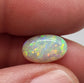 2.4cts dark opal with a yellow multicolor pallet and mixed patterns