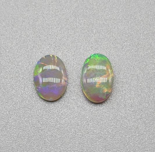 1ct Mismatched pair Dark opal with greens, oranges and light blues