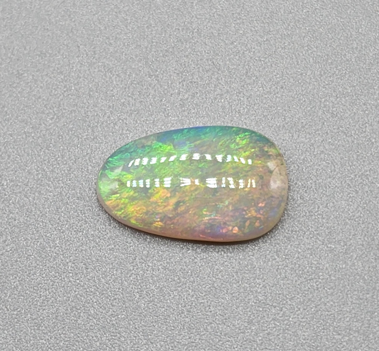 1.9cts Crystal Opal small flash pattern and green yellow and orange color play