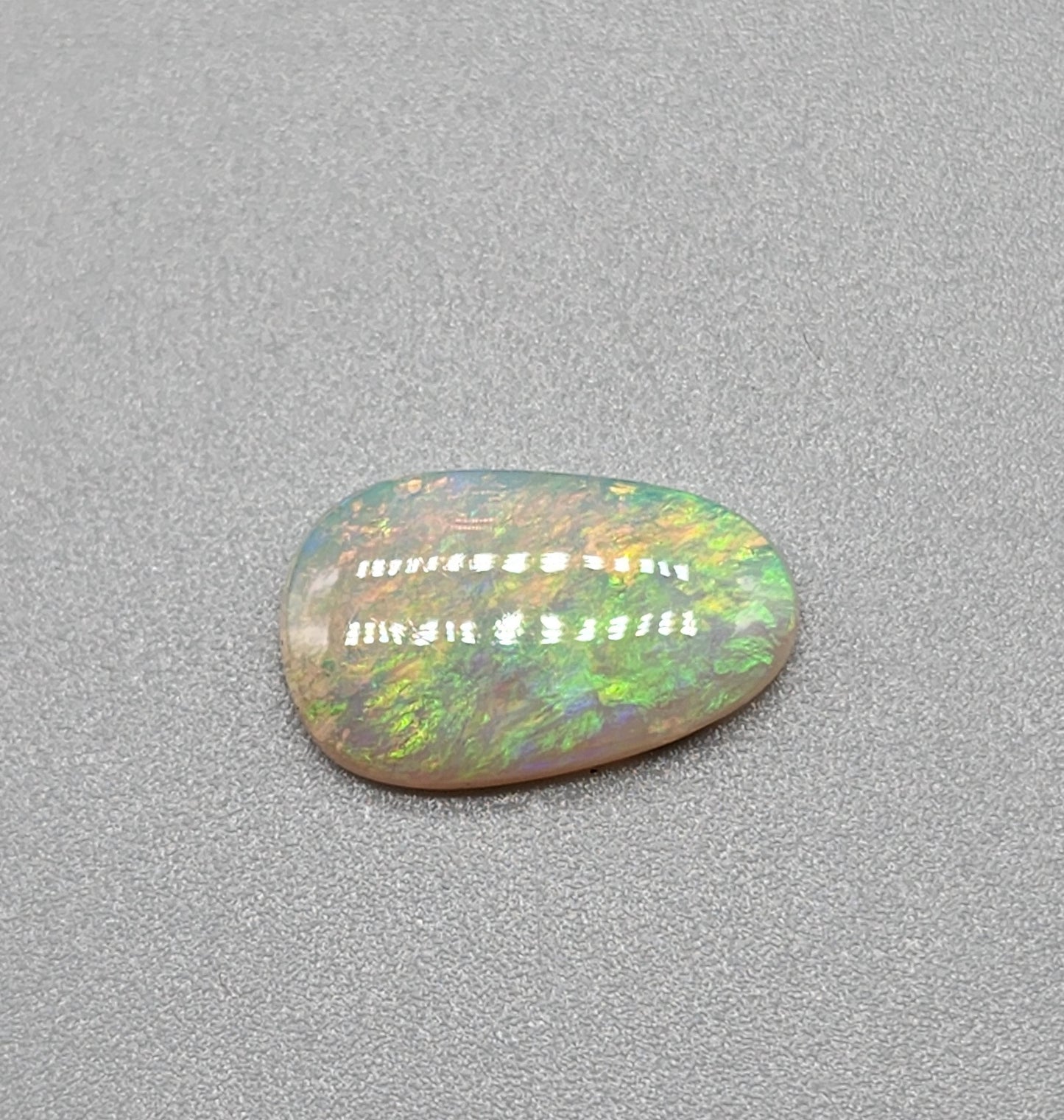 1.9cts Crystal Opal small flash pattern and green yellow and orange color play