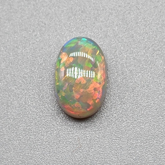 1.4ct with a pastel multi color pallet, and an incredible, full faced floral pattern.