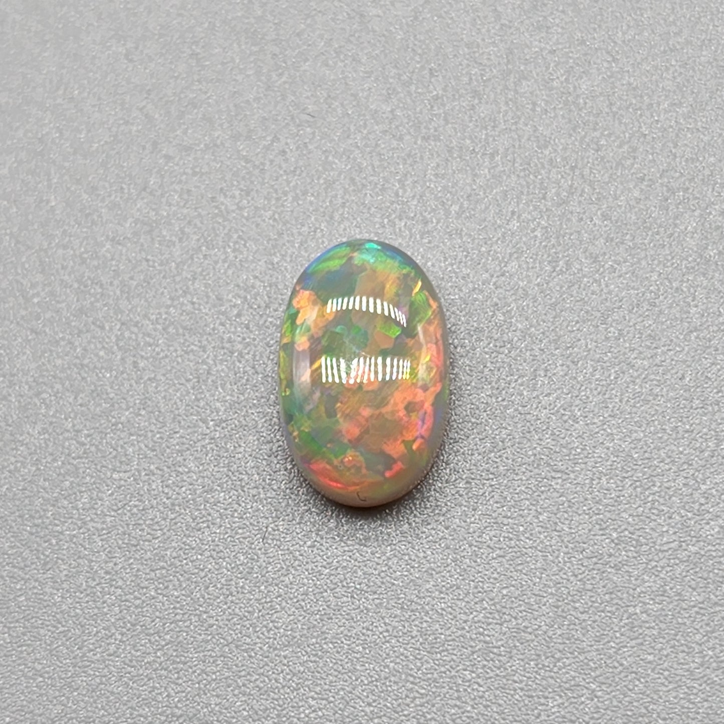 1.4ct with a pastel multi color pallet, and an incredible, full faced floral pattern.