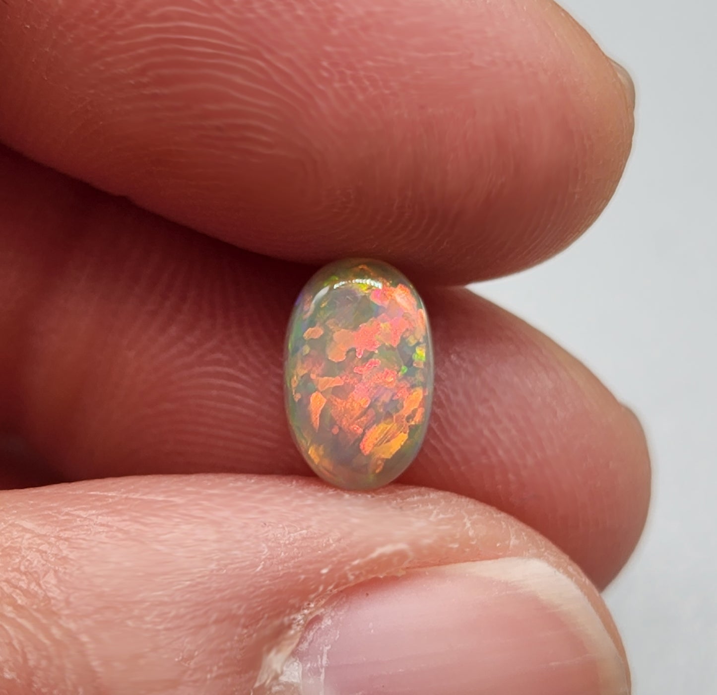 1.4ct with a pastel multi color pallet, and an incredible, full faced floral pattern.