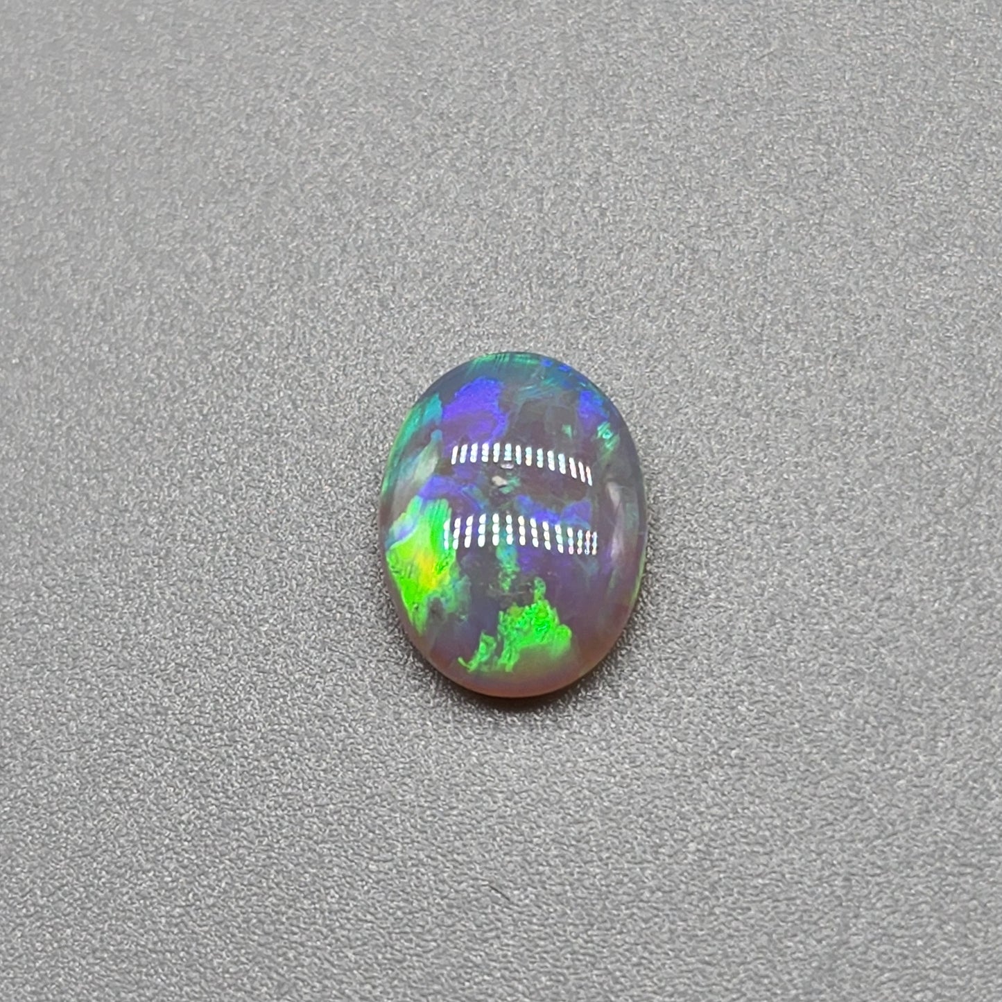 1cts Dark opal with Aesthetic pattern and green blue color pallet.