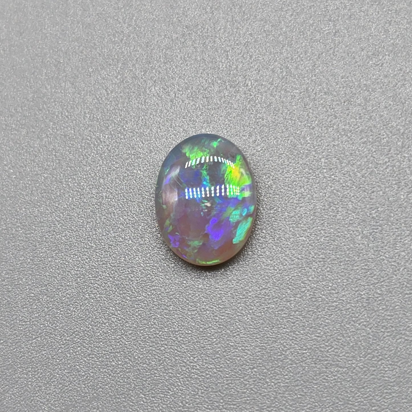 1cts Dark opal with Aesthetic pattern and green blue color pallet.