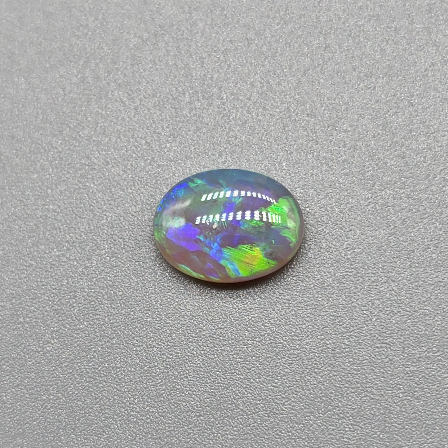 1cts Dark opal with Aesthetic pattern and green blue color pallet.