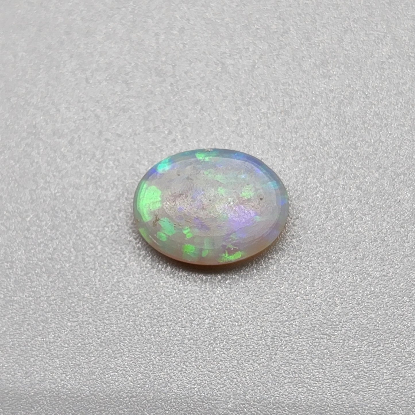 1cts Dark opal with Aesthetic pattern and green blue color pallet.