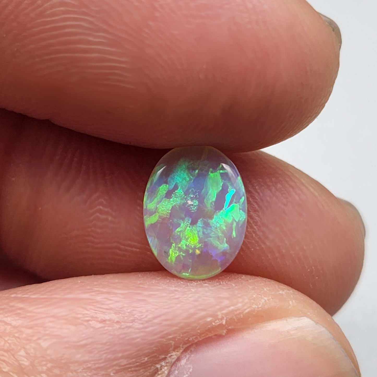 1cts Dark opal with Aesthetic pattern and green blue color pallet.