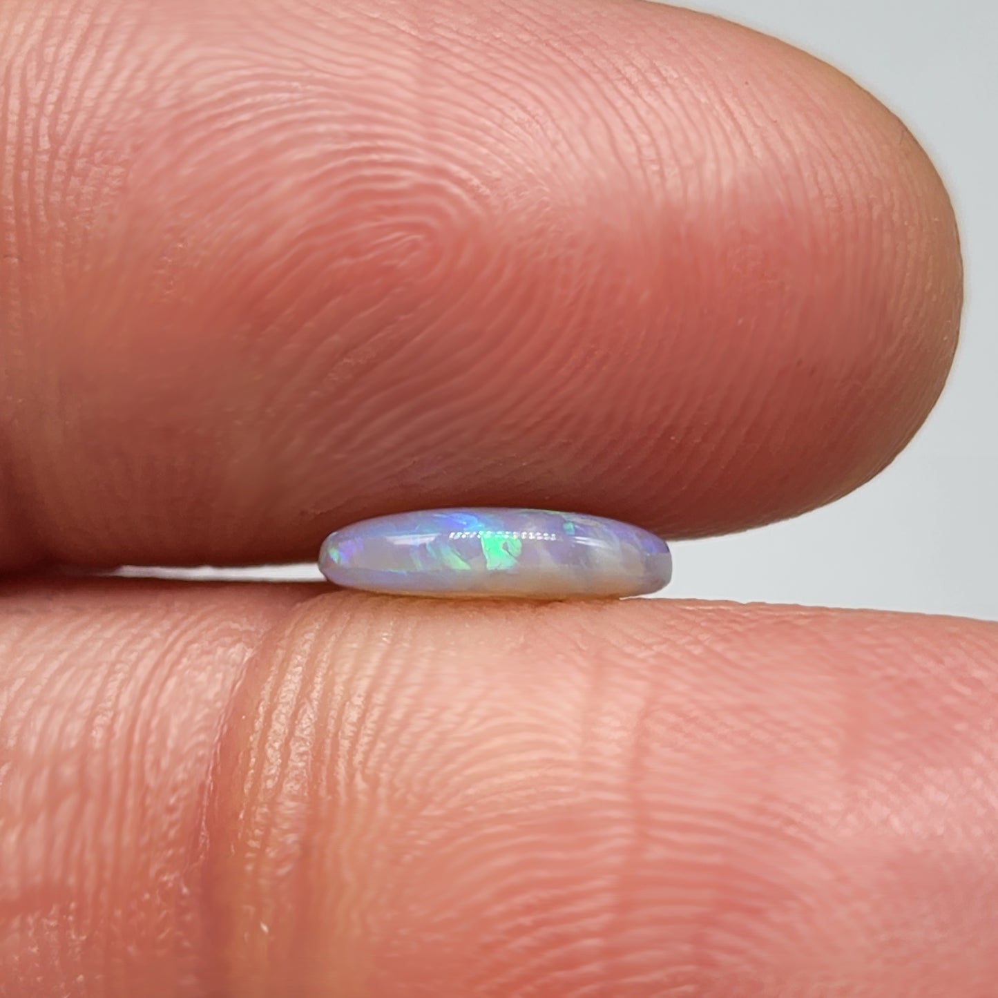 1cts Dark opal with Aesthetic pattern and green blue color pallet.