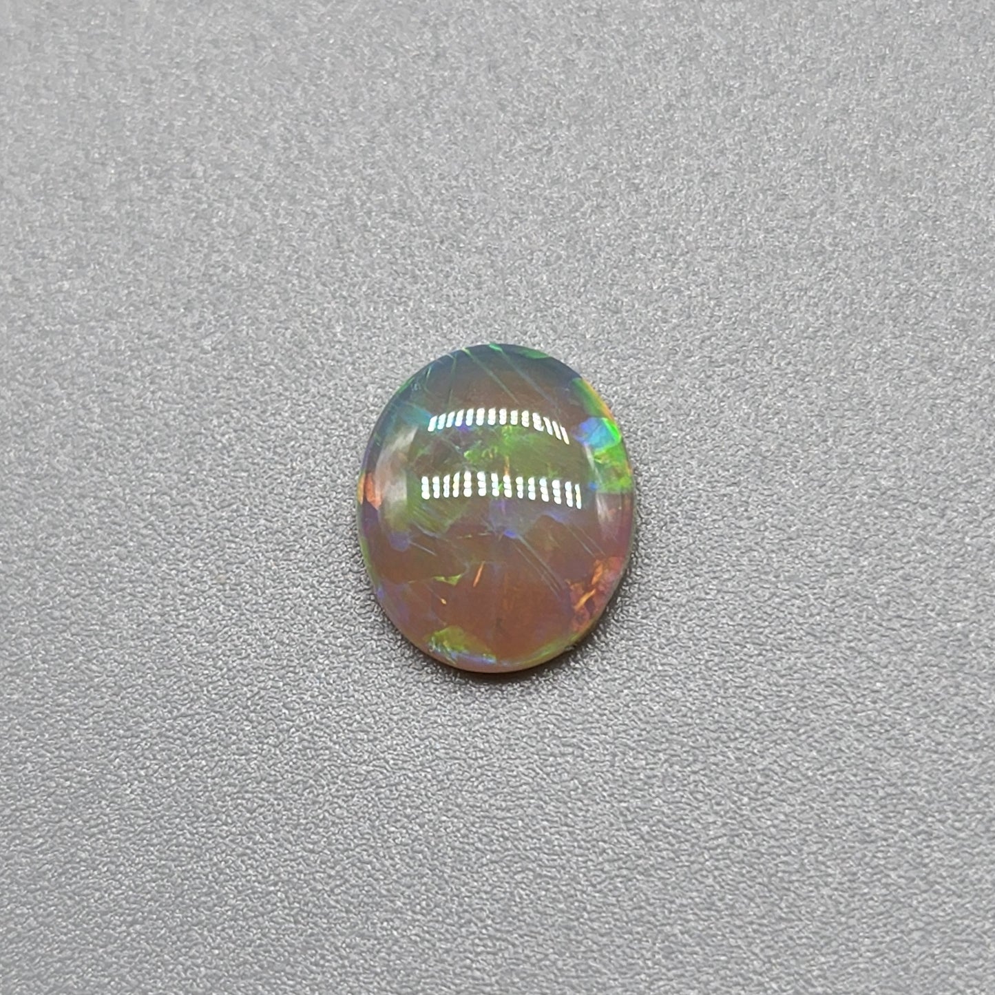 0.95cts Dark Opal with vivid blocky multi color pattern