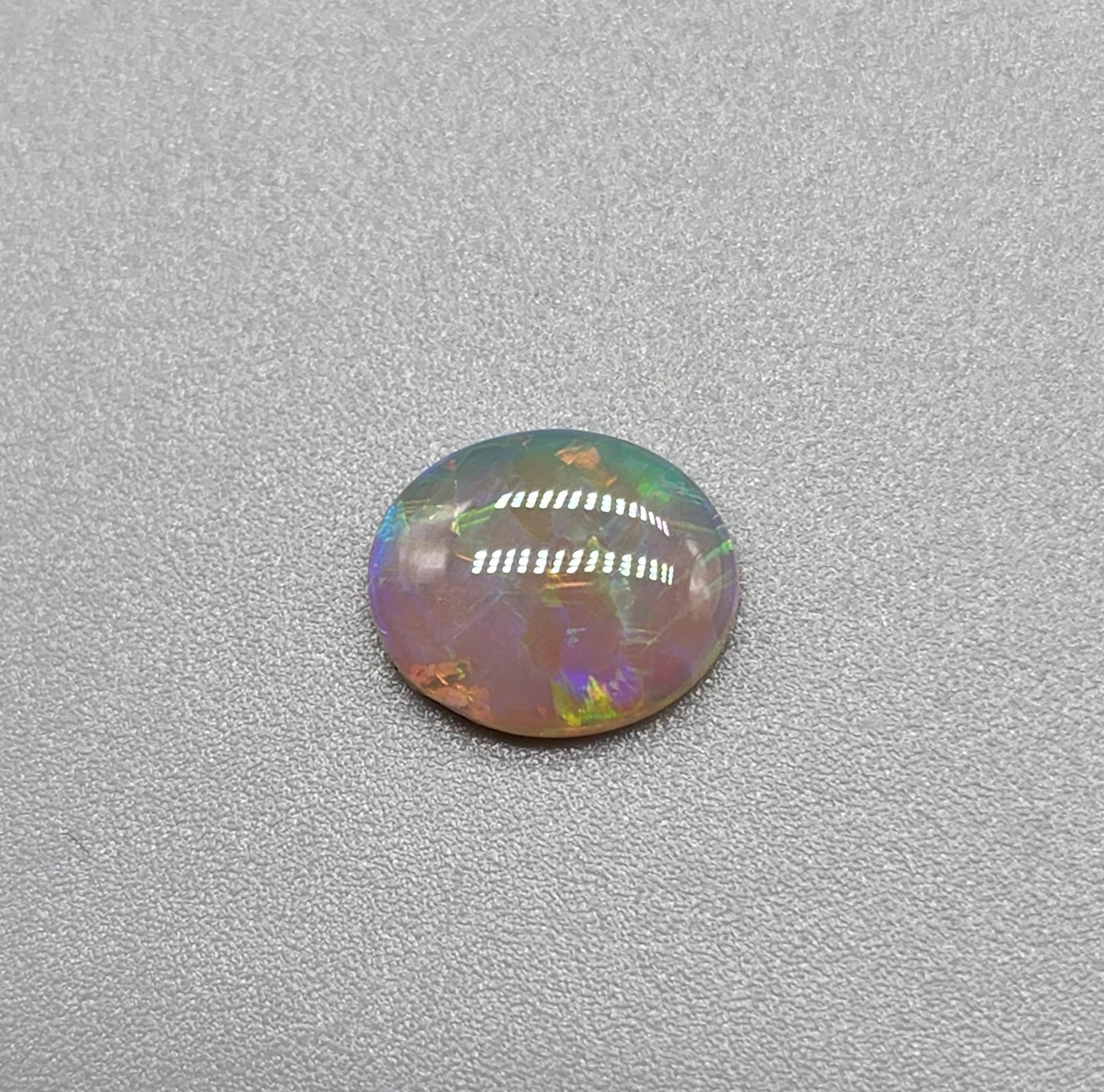 0.95cts Dark Opal with vivid blocky multi color pattern