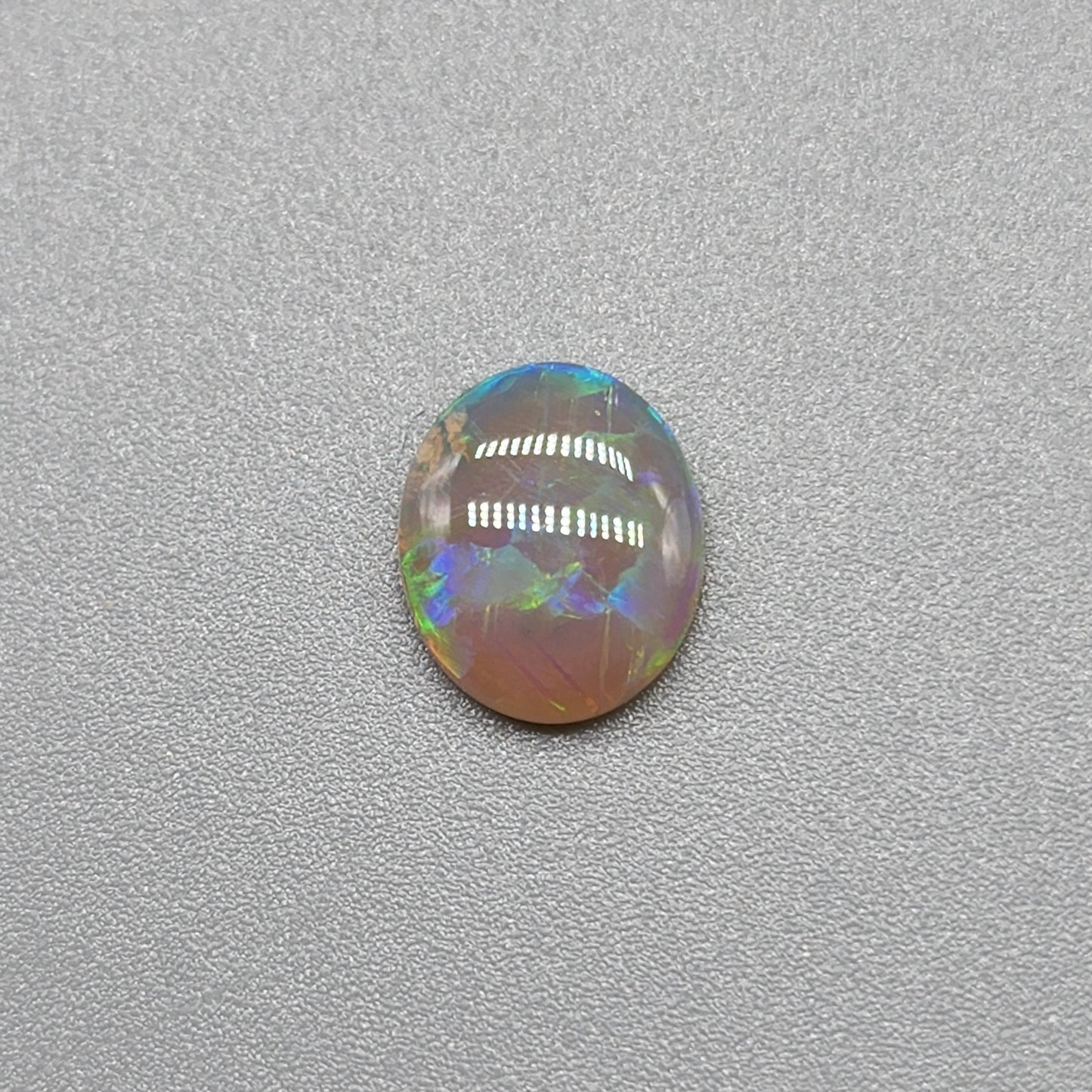 0.95cts Dark Opal with vivid blocky multi color pattern