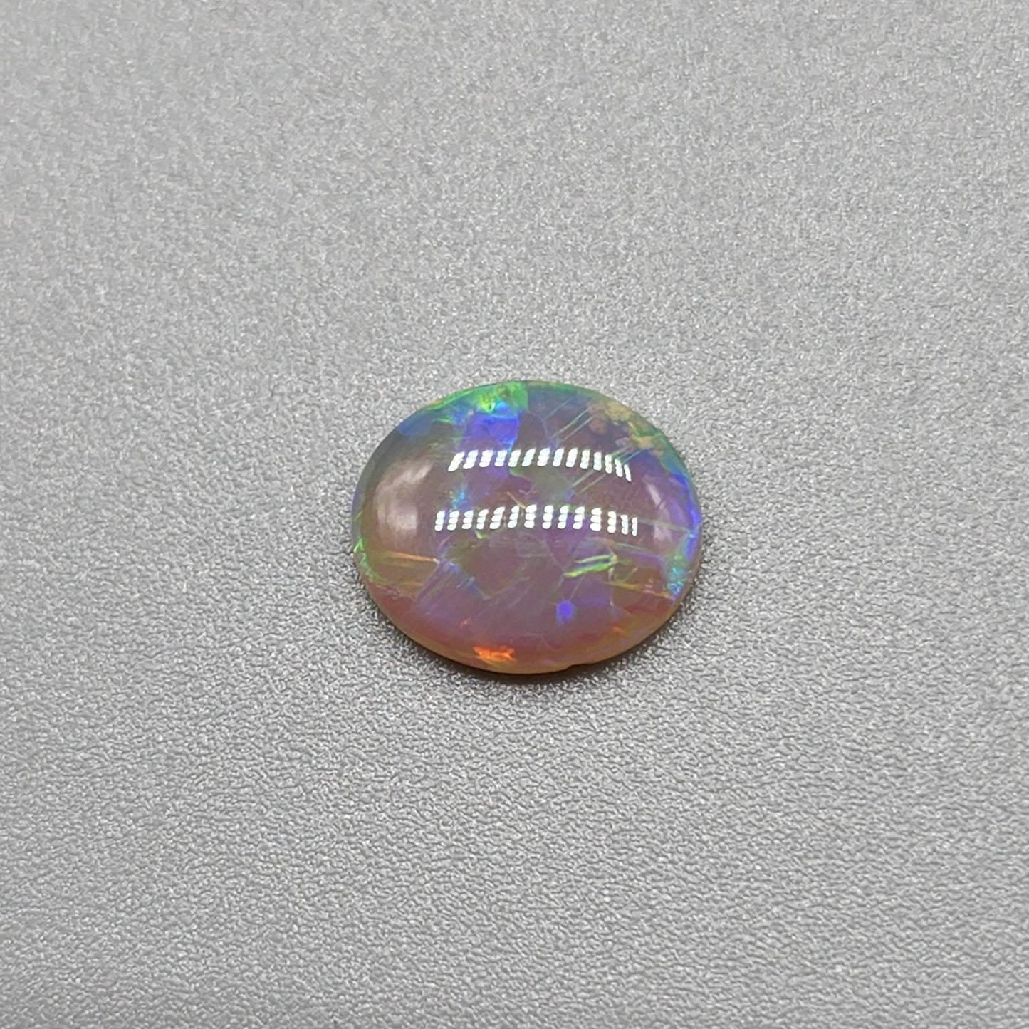 0.95cts Dark Opal with vivid blocky multi color pattern