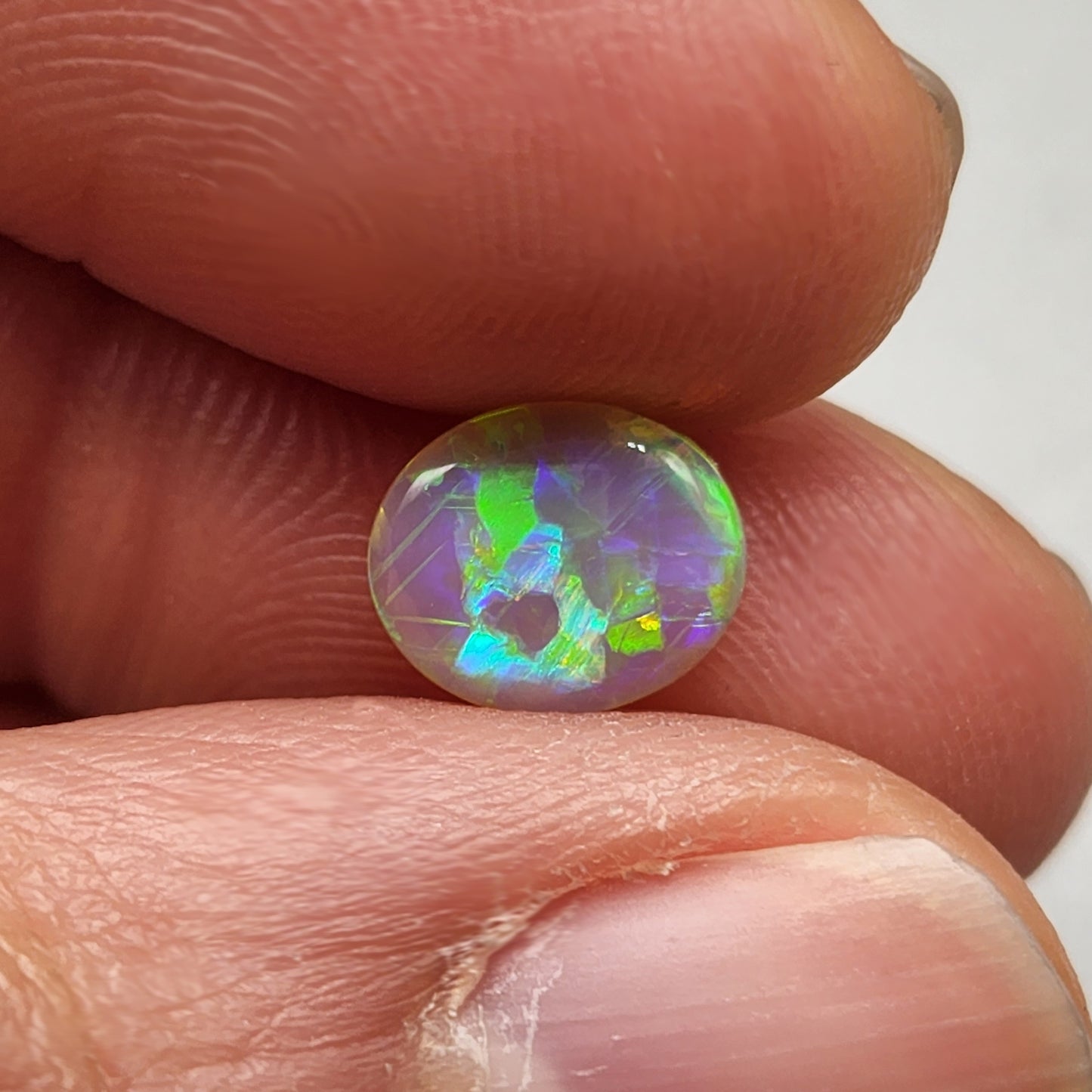 0.95cts Dark Opal with vivid blocky multi color pattern