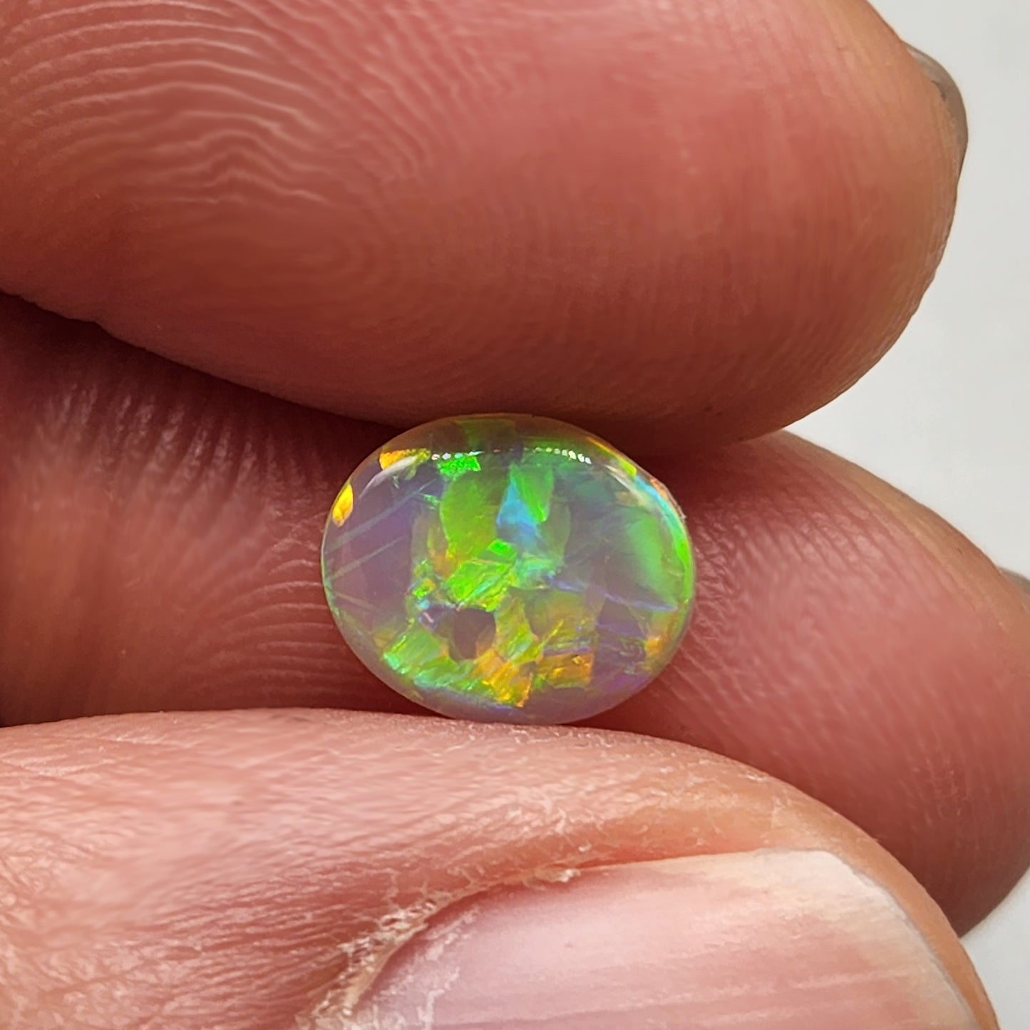 0.95cts Dark Opal with vivid blocky multi color pattern