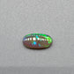 0.5ct Dark Opal with vivid green flash and hints of blue