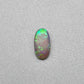 0.5ct Dark Opal with vivid green flash and hints of blue