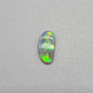 0.65ct Dark Opal with gold green color play