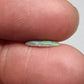 0.65ct Dark Opal with gold green color play