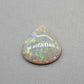 6.4cts Light Opal with yellow and orange color play