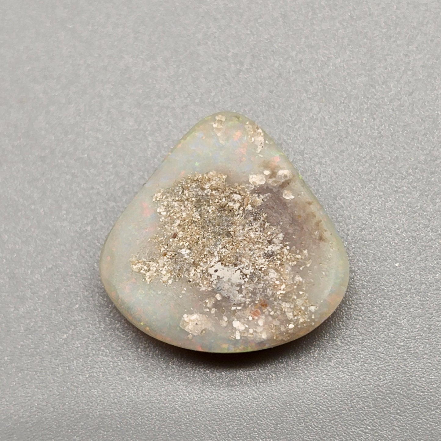 6.4cts Light Opal with yellow and orange color play