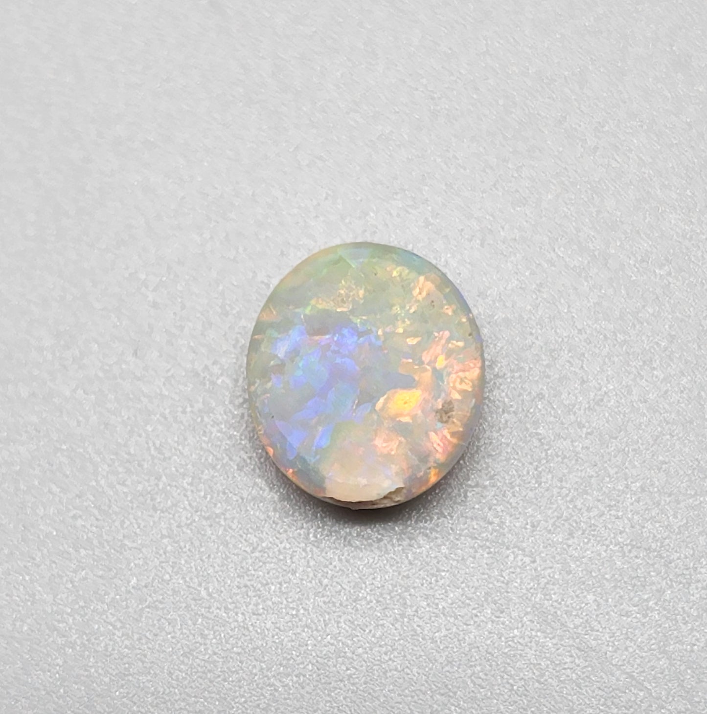 2.5cts Dark opal with bright sunset colors and mixed patterns